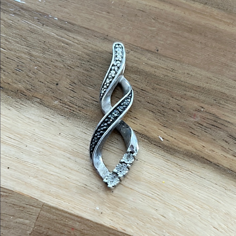 Elegant Silver and Black Twisted Pendant